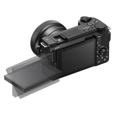 Sony ZV-E10 II content creator camera + 16-50mm II + GP-VPT2BT Wireless Grip scherm uitgeklapt schuin achter bovenkant