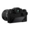 Fujifilm X-T5 systeemcamera Zwart + Sigma 18-50mm f/2.8 scherm uitgeklapt schuin achter